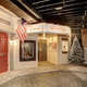 Image for article titled There's Life-Sized Fake Town Complete With Real Cars In This Mansion's Basement